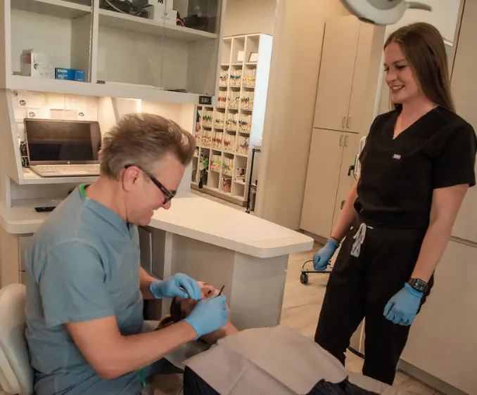 Dr. Minth treating a patient