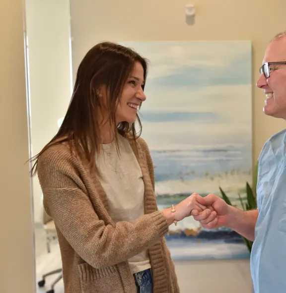 Dr. Jeffrey Minth with a patient
