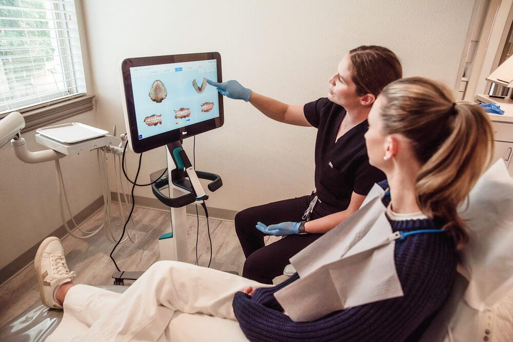 dental assistant with a patient in rockwall